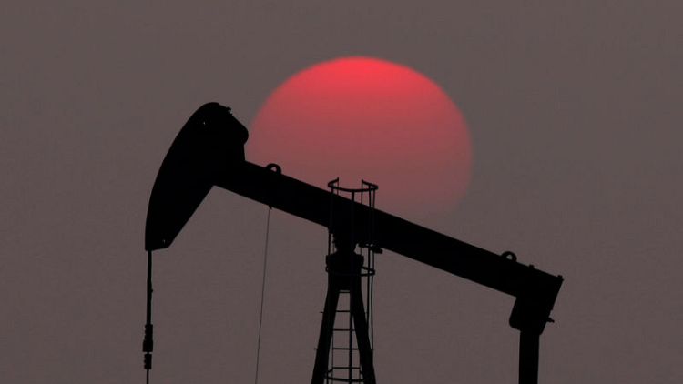 Oil slumps 4% on U.S. crude build, slowing demand fears