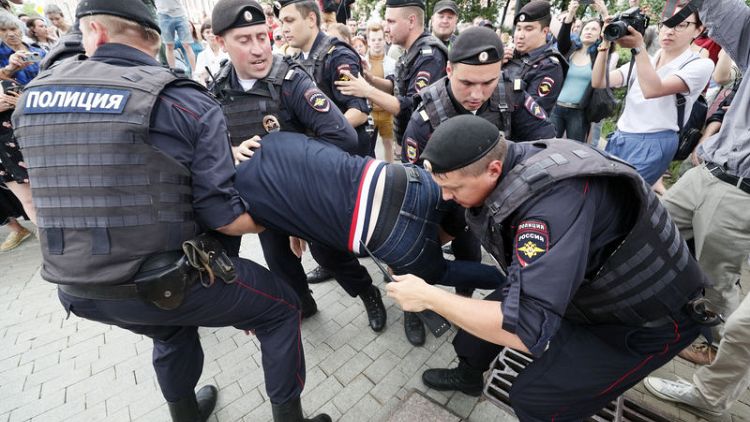 Russian police say they detain over 200 at Moscow journalist protest