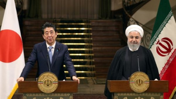 Le président iranien Hassan Rohani (d) et le Premier ministre japonais Shinzo Abe lors d'une conférence de presse commune, le 12 juin 2019 à Téhéran Le président iranien Hassan Rohani (d) et le Premier ministre japonais Shinzo Abe lors d'une conférence de presse commune, le 12 juin 2019 à Téhéran