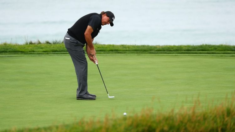 I'm still in it, says Mickelson, despite botched putt