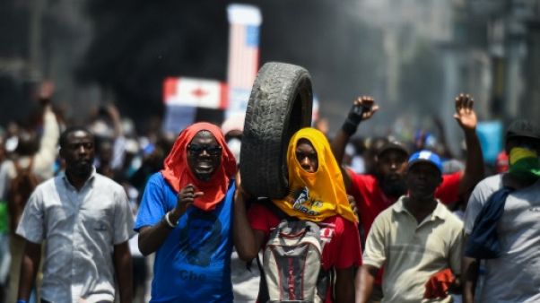 Manifestation pour réclamer la démission du président Jovenel Moïse, le 13 juin 2019 à Port-au-Prince, en Haïti Manifestation pour réclamer la démission du président Jovenel Moïse, le 13 juin 2019 à Port-au-Prince, en Haïti