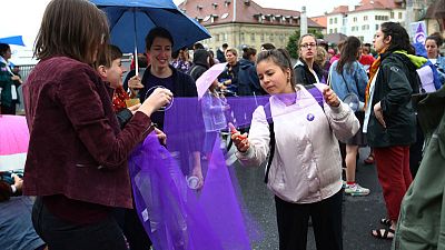 Swiss women stage strike for long-delayed equality Swiss women stage strike for long-delayed equality