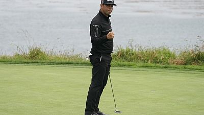 Golf: On fire Woodland takes U.S. Open lead, Tiger fumes Golf: On fire Woodland takes U.S. Open lead, Tiger fumes