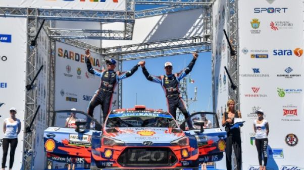 Les Espagnols Daniel Sordo (d) et Carlos del Barrio vainqueurs du rallye de Sardaigne le 16 juin 2019 Les Espagnols Daniel Sordo (d) et Carlos del Barrio vainqueurs du rallye de Sardaigne le 16 juin 2019