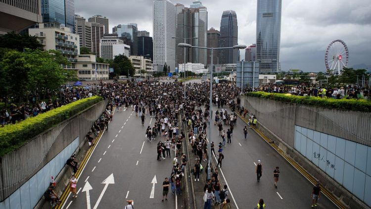 China stands by Hong Kong leader after days of street protests