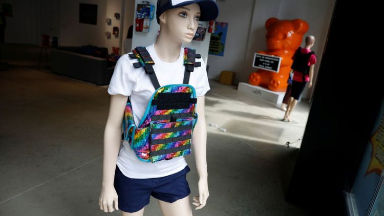 Tiny bulletproof vests centrepiece of New York art exhibit on school shootings