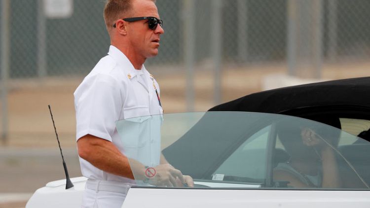 Murder or mutiny? Arguments begin in Navy SEAL's court martial in San Diego