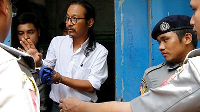 As Myanmar military takes critics to court, some want Suu Kyi to act As Myanmar military takes critics to court, some want Suu Kyi to act