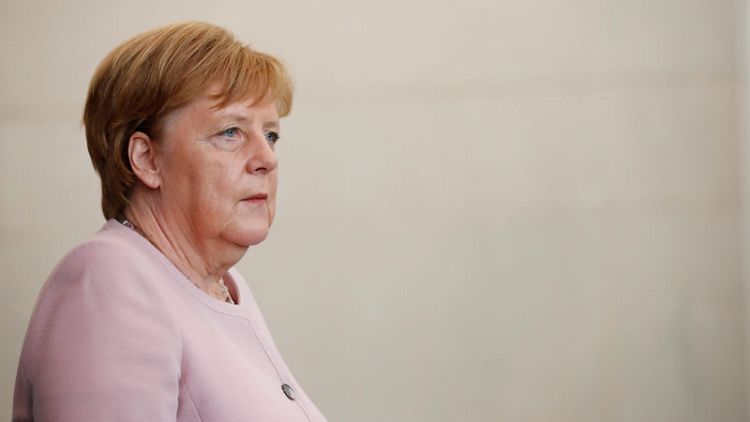 Merkel: Will only lift Russia sanctions if Ukraine's sovereignty restored
