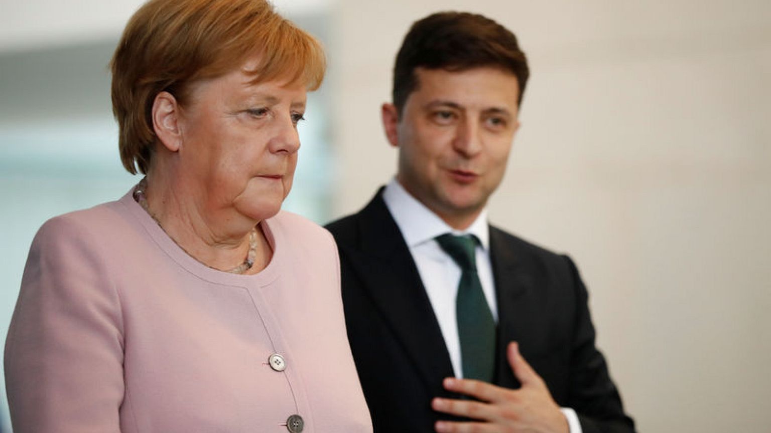 Merkel says recovered from shaking bout after drinking water