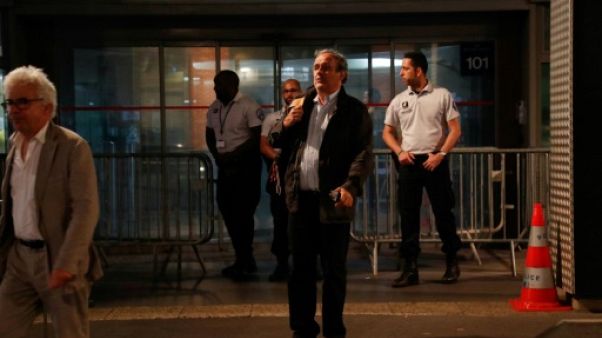 L'ex-patron de l'UEFA Michel Platini (d), à sa sortie de garde à vue à Nanterre, le 19 juin 2019 L'ex-patron de l'UEFA Michel Platini (d), à sa sortie de garde à vue à Nanterre, le 19 juin 2019