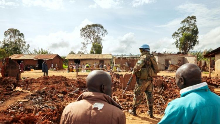 Des soldats de l'ONU en patrouille à Lita, en Ituri, le 27 mars 2018 après des affrontements entre les communautés hema et lendu, en RDC 