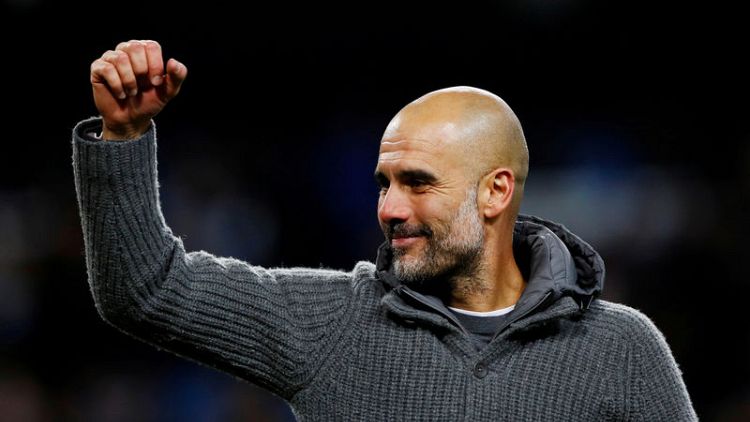 Manchester City boss Guardiola's cardigan raises over 6,000 pounds for charity