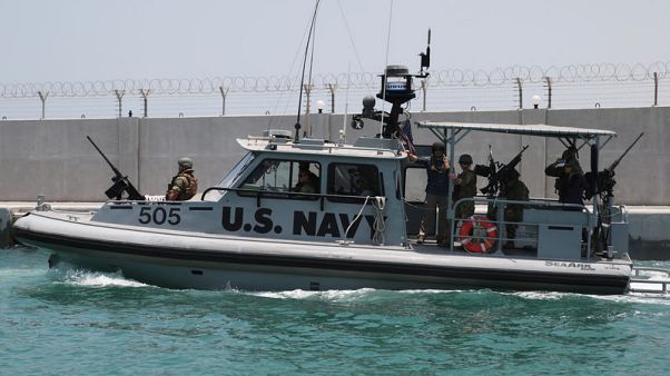 U.S. Navy says mine fragments, magnet point to Iran in Gulf tanker attack