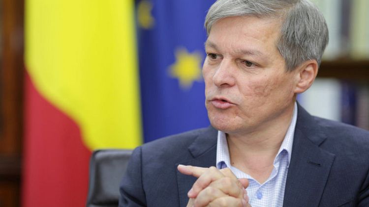 Ex-Romanian PM elected head of European centrist group with Macron's blessing