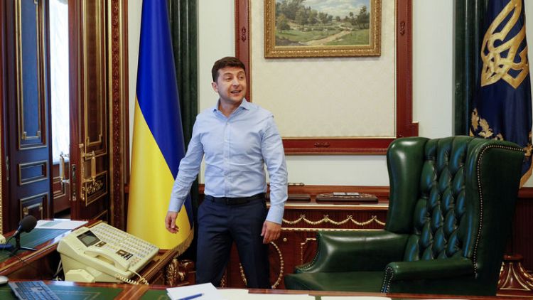 Party of Ukraine's president leads opinion poll ahead of July vote