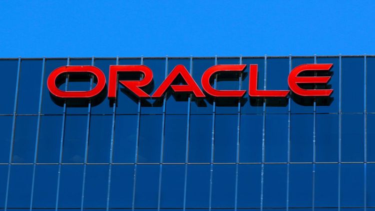 Oracle quarterly profit beats estimates; shares rise