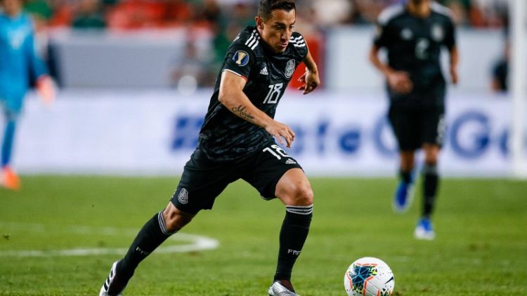 Guardado fires Mexico into quarter-finals with 3-1 win over Canada