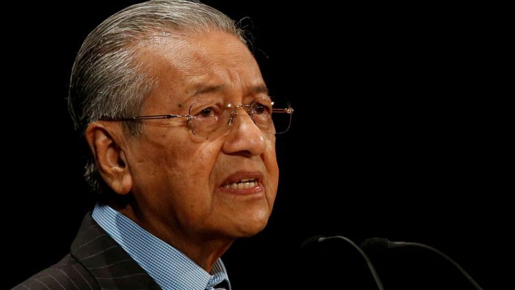 Malaysia's Mahathir says Russia being made a scapegoat for downing of MH17