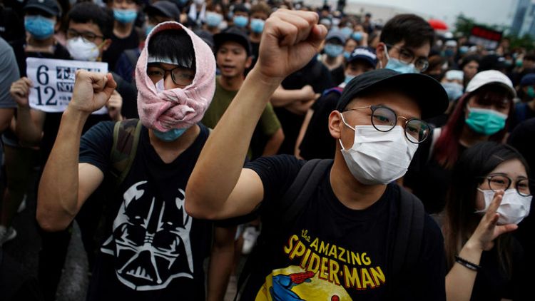Activists in Hong Kong make pitch to extradition protesters - register to vote