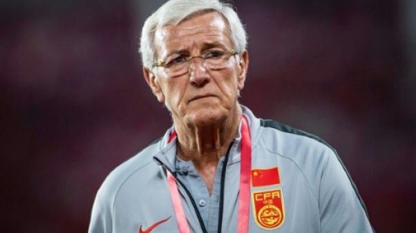 L'Italien Marcello Lippi, entraîneur de l'équipe de Chine, suit le match amical contre le Tadjikistan, le 11 juin 2019 à Canton L'Italien Marcello Lippi, entraîneur de l'équipe de Chine, suit le match amical contre le Tadjikistan, le 11 juin 2019 à Canton