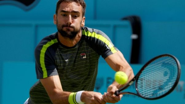 Le Croate Marin Cilic lors du 1er tour du tournoi sur gazon du Queen's, à Londres, le 17 juin 2019 Le Croate Marin Cilic lors du 1er tour du tournoi sur gazon du Queen's, à Londres, le 17 juin 2019