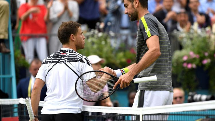 Cilic out at Queen's, Tsitsipas through at last