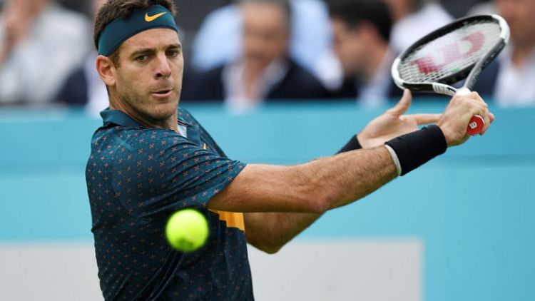 Del Potro out of Wimbledon after re-fracturing kneecap