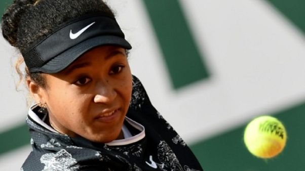 La Japonaise Naomi Osaka contre la Slovaque Anna Karolina Schmiedlova au 1er tour de Roland-Garros, le 28 mai 2019 à Paris La Japonaise Naomi Osaka contre la Slovaque Anna Karolina Schmiedlova au 1er tour de Roland-Garros, le 28 mai 2019 à Paris