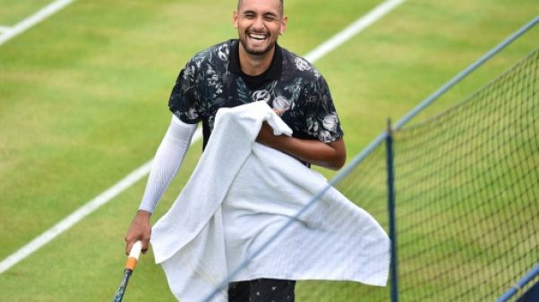 L'Australien Nick Kyrgios contre l'Espagnol Roberto Carballes Baena au 1er tour du tournoi du Queen's, le 20 juin 2019 à Londres L'Australien Nick Kyrgios contre l'Espagnol Roberto Carballes Baena au 1er tour du tournoi du Queen's, le 20 juin 2019 à Londres