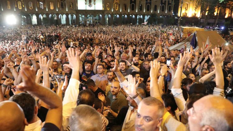 Georgians angry over Russian lawmaker's visit try to storm parliament