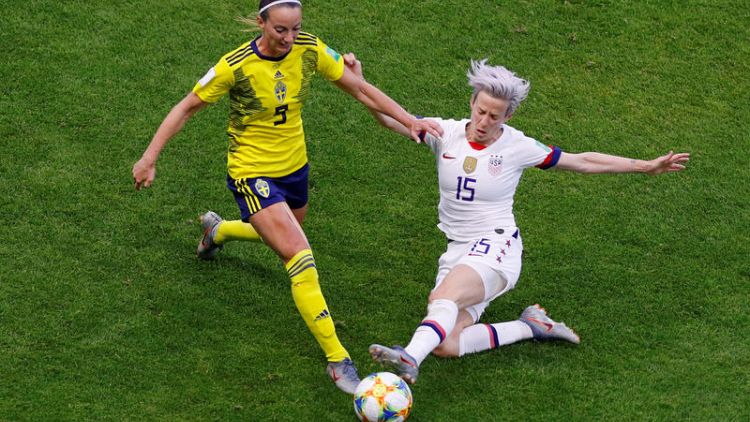 Perfect U.S. beat Sweden 2-0 to top Group F