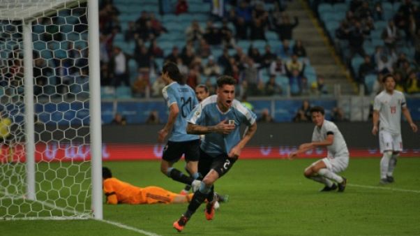 Le défenseur central uruguayen Jose Maria Gimenez buteur lors du match de phase de groupes de la Copa America face au Japon, à Porto Alegre au Brésil, le 20 juin 2019 Le défenseur central uruguayen Jose Maria Gimenez buteur lors du match de phase de groupes de la Copa America face au Japon, à Porto Alegre au Brésil, le 20 juin 2019