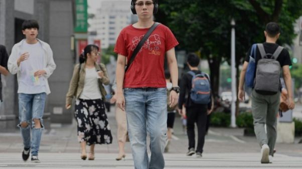Edward, venu de Hong Kong pour étudier à Taïwan, dans une rue de Taipei le 18 juin 2019 Edward, venu de Hong Kong pour étudier à Taïwan, dans une rue de Taipei le 18 juin 2019