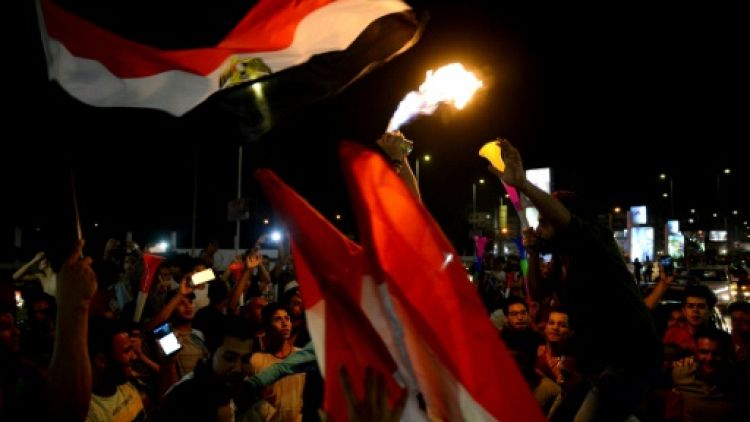 Les Egyptiens en liesse dans les rues du Caire, après la victoire de leur équipe sur le Zimbabwe en match d'ouverture de la CAN, le 21 juin 2019 