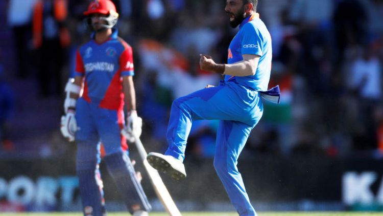Shami final-over hat-trick steals India win over Afghanistan