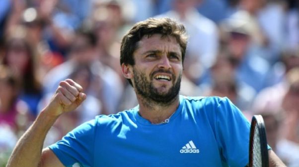 Le Français Gilles Simon exulte après avoir battu le Russe Daniil Medvedev en demi-finales du tournoi du Queens, le 22 juin 2019 à Londres Le Français Gilles Simon exulte après avoir battu le Russe Daniil Medvedev en demi-finales du tournoi du Queens, le 22 juin 2019 à Londres