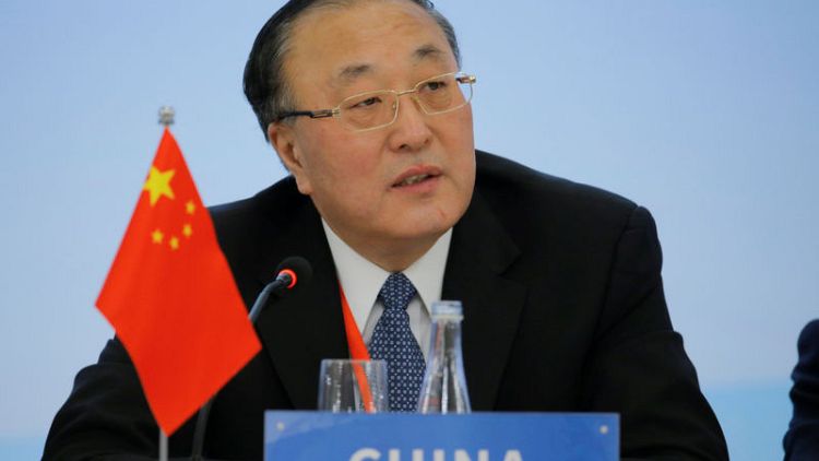 China's assistant foreign minister says global community sees harm from protectionism