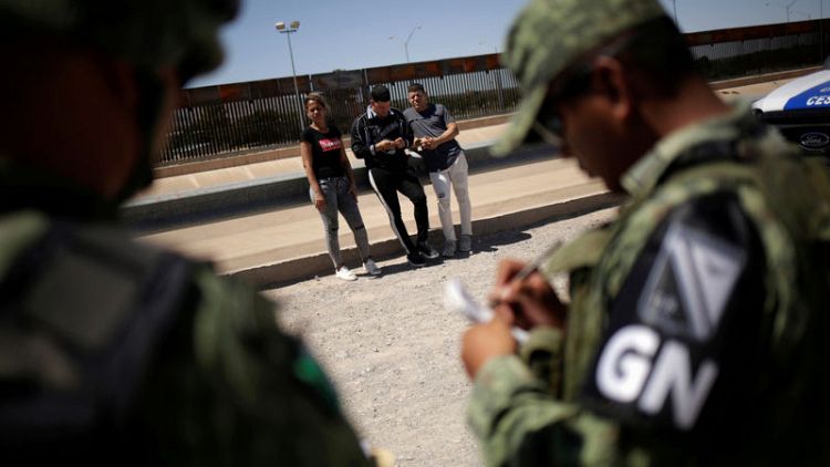 Mexico says it has deployed 15,000 forces in the north to halt U.S.-bound migration