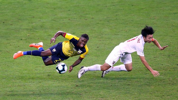 Ecuador's draw with Japan send Paraguay into quarters