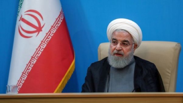 Une photo obtenue auprès de la présidence iranienne montre le président Hassan Rohani lors d'une rencontre avec des ministres à Téhéran, le 25 juin 2019 Une photo obtenue auprès de la présidence iranienne montre le président Hassan Rohani lors d'une rencontre avec des ministres à Téhéran, le 25 juin 2019