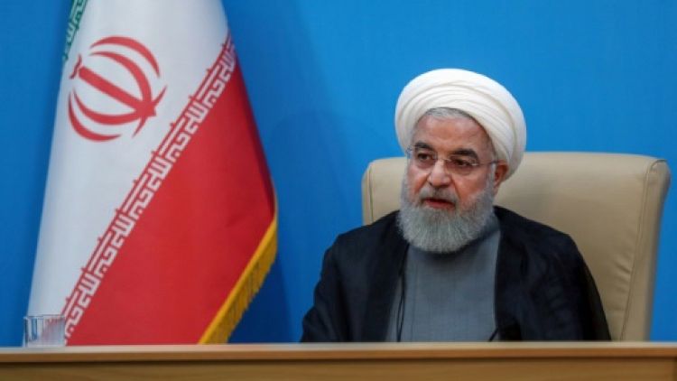 Une photo obtenue auprès de la présidence iranienne montre le président Hassan Rohani lors d'une rencontre avec des ministres à Téhéran, le 25 juin 2019 