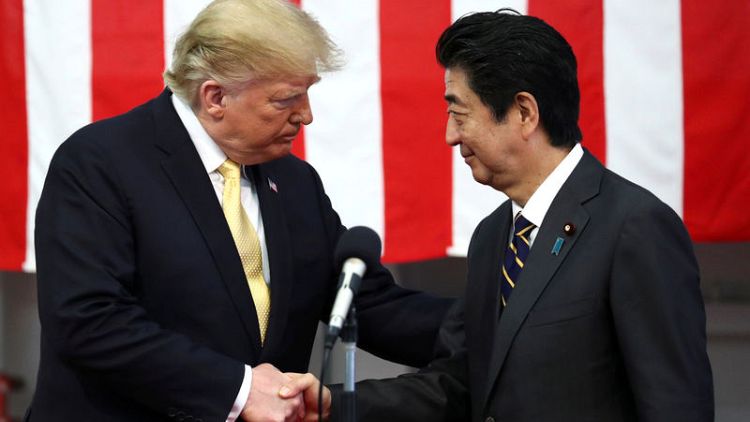 Trump reassures Tokyo he will stick with security pact - Japan government