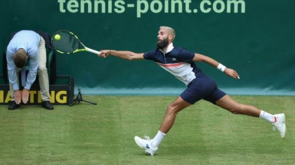 Le Français Benoît Paire contre son compatriote Jo-Wilfried Tsonga au 1er tour du tournoi de Halle (Allemagne), le 18 juin 2019 Le Français Benoît Paire contre son compatriote Jo-Wilfried Tsonga au 1er tour du tournoi de Halle (Allemagne), le 18 juin 2019