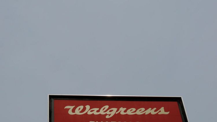 Walgreens third-quarter profit falls 23.6%