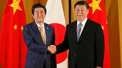 مسؤول ياباني: شي وآبي يتفقان على الحاجة إلى "تجارة حرة وعادلة"
