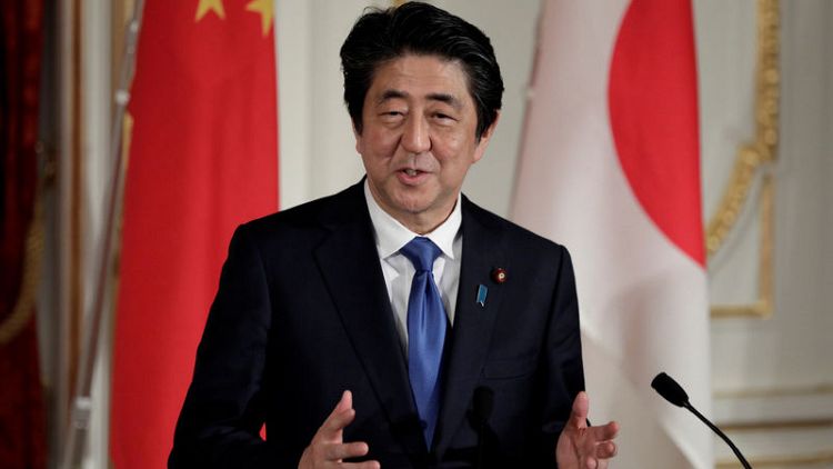 Japan PM Abe, China's Xi agree on need for 'free, fair' trade