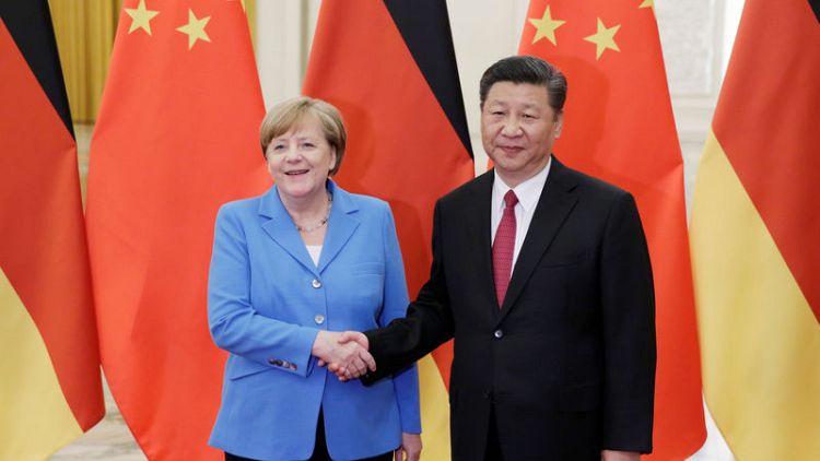 China's Xi, Germany's Merkel agree Iran issue should be resolved peacefully - Xinhua