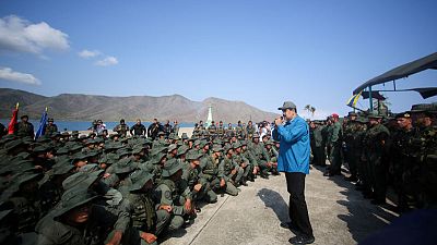 Special Report: Why the military still stands by Venezuela's beleaguered president Special Report: Why the military still stands by Venezuela's beleaguered president