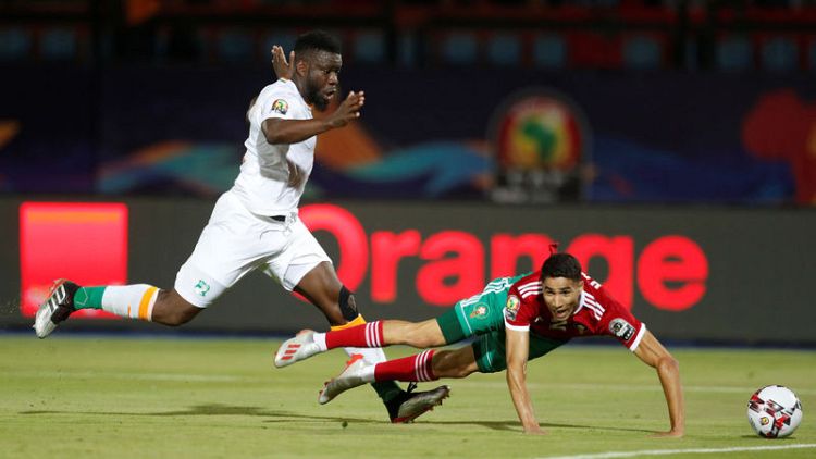 Morocco beat Ivory Coast to advance at Cup of Nations